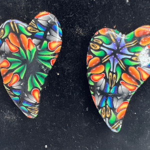 Kaleidoscope patterned heart shaped clay earrings
